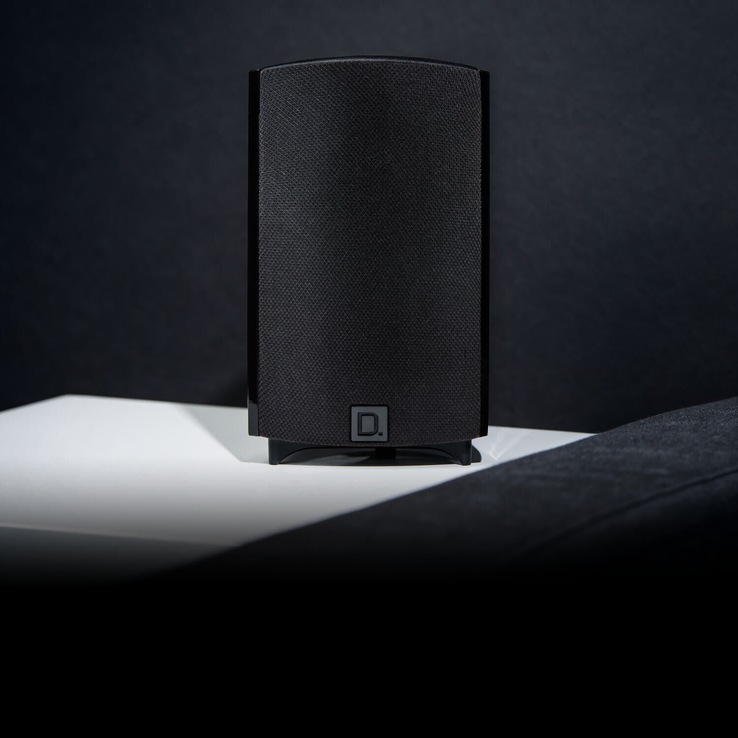 Bookshelf speaker on white table